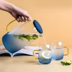 CARAFE A JUS +LOT DE 4 VERRES