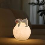 STATUE  LAPIN NEZ ROUGE AVEC BALLON