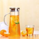 CARAFE EN VERRE TRANSPARANT TETE INOX 20 CM